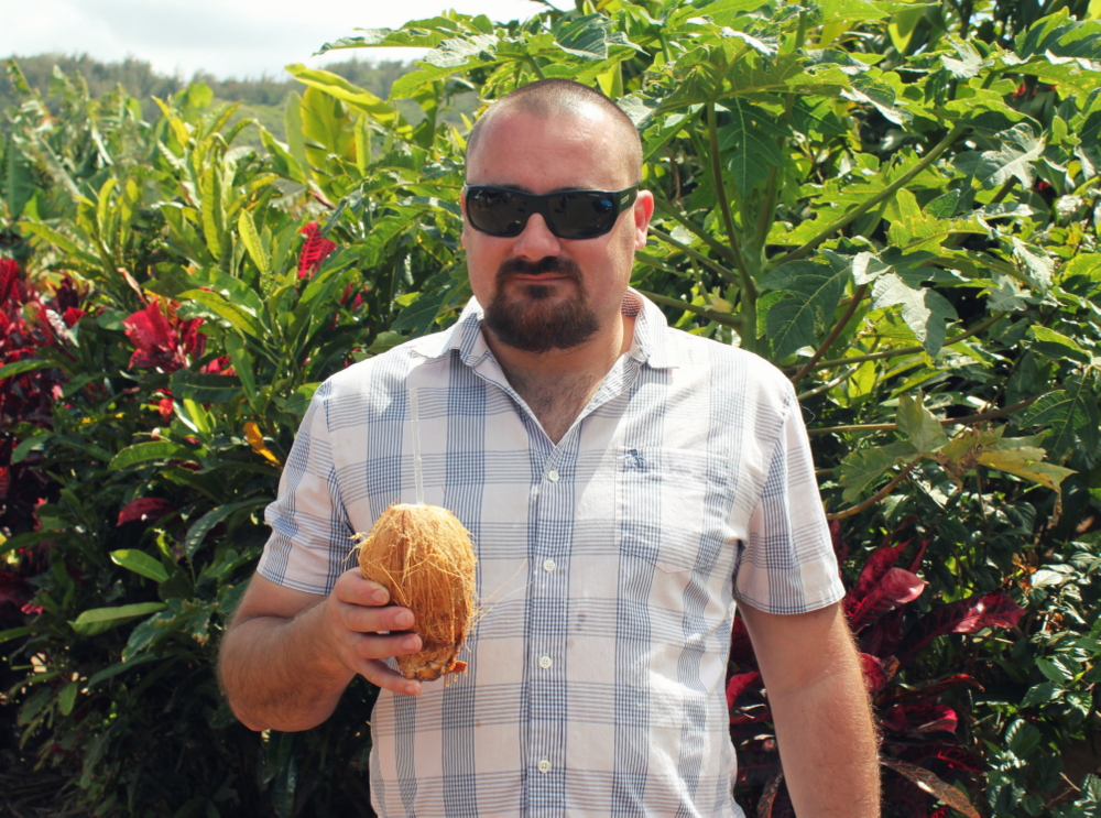 After fish tacos, we stop at a farm stand for cold, fresh coconut